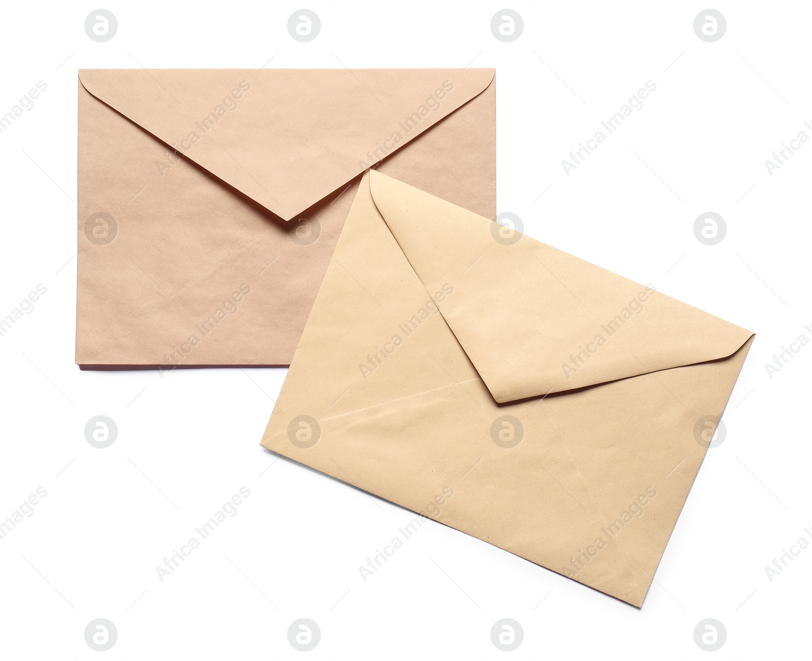 Photo of Envelopes isolated on white, top view. Mockup for design