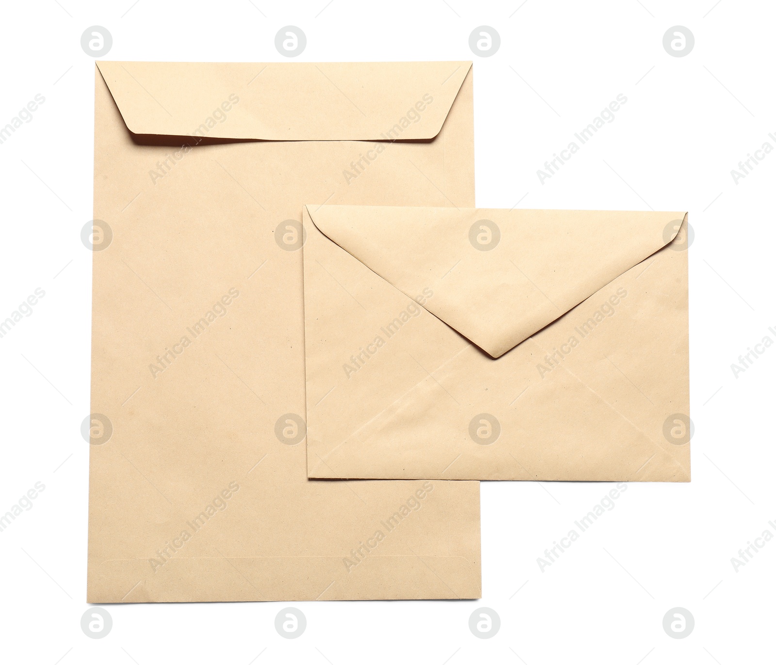 Photo of Envelopes isolated on white, top view. Mockup for design