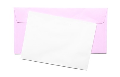 Photo of Pink envelope with card isolated on white, top view. Mockup for design