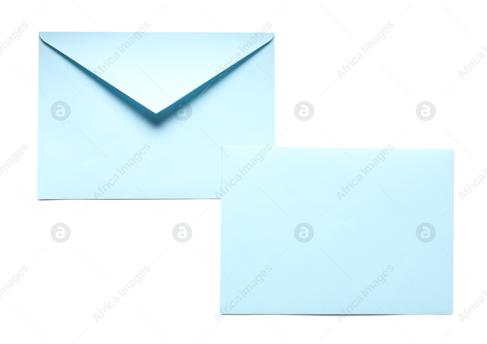 Photo of Blue envelopes isolated on white, top view. Mockup for design