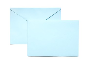 Photo of Blue envelopes isolated on white, top view. Mockup for design