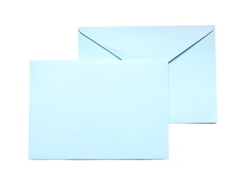 Photo of Blue envelopes isolated on white, top view. Mockup for design