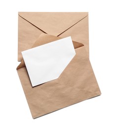 Photo of Envelopes isolated with card on white, top view. Mockup for design