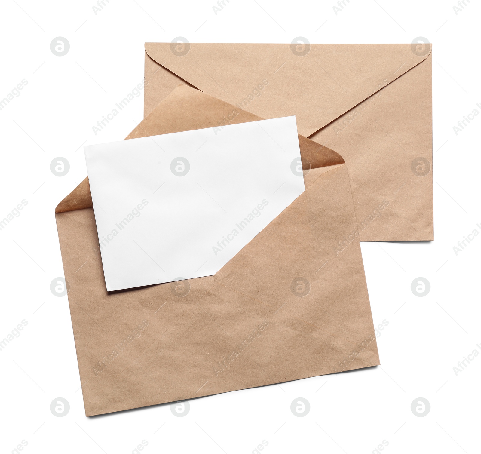 Photo of Envelopes isolated with card on white, top view. Mockup for design