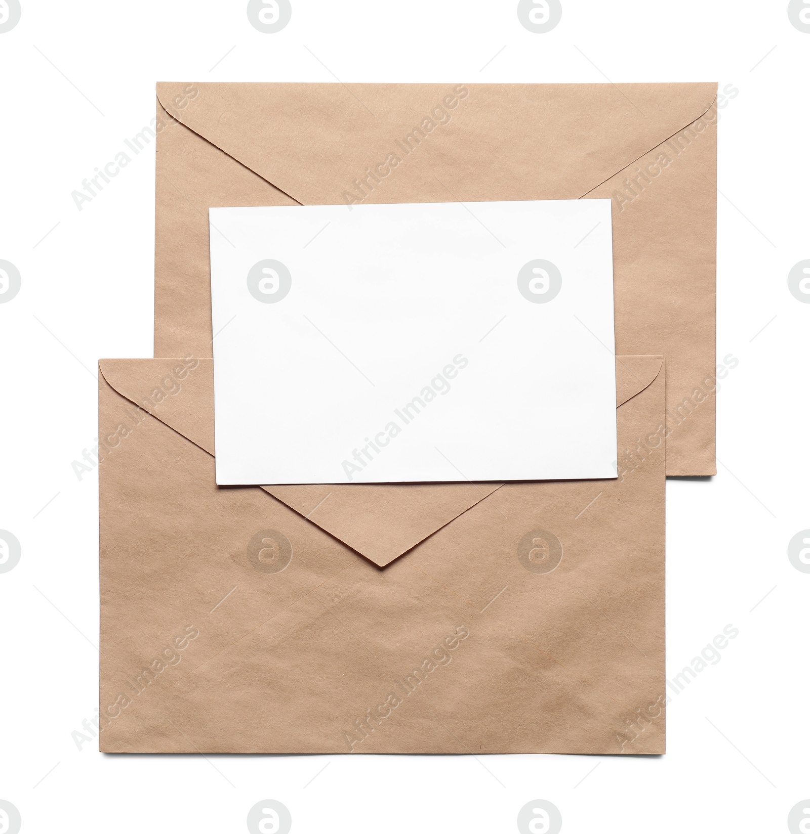 Photo of Envelopes isolated with card on white, top view. Mockup for design