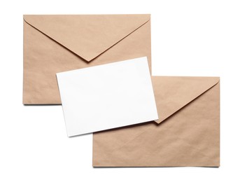 Photo of Envelopes isolated with card on white, top view. Mockup for design