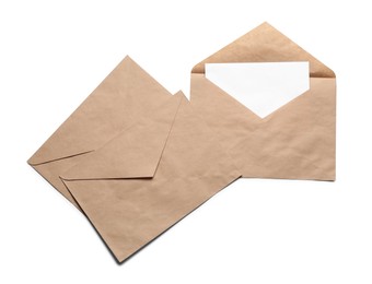 Photo of Envelopes isolated with card on white, top view. Mockup for design