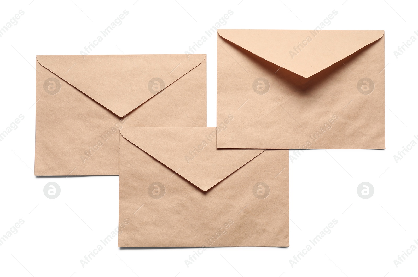 Photo of Envelopes isolated on white, top view. Mockup for design