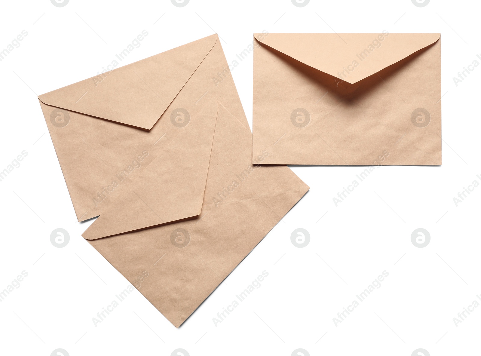 Photo of Envelopes isolated on white, top view. Mockup for design