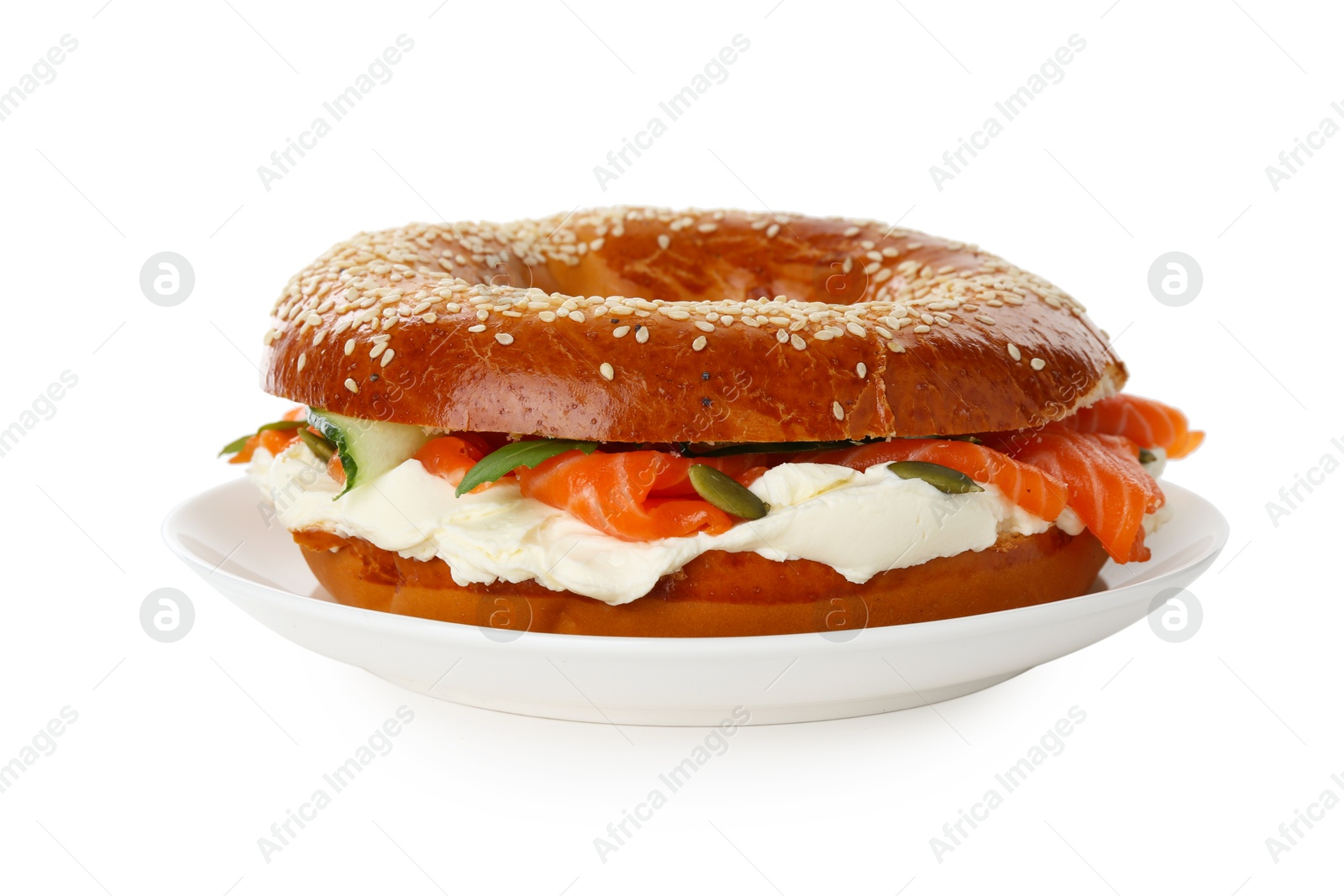 Photo of Delicious bagel with salmon and cream cheese isolated on white