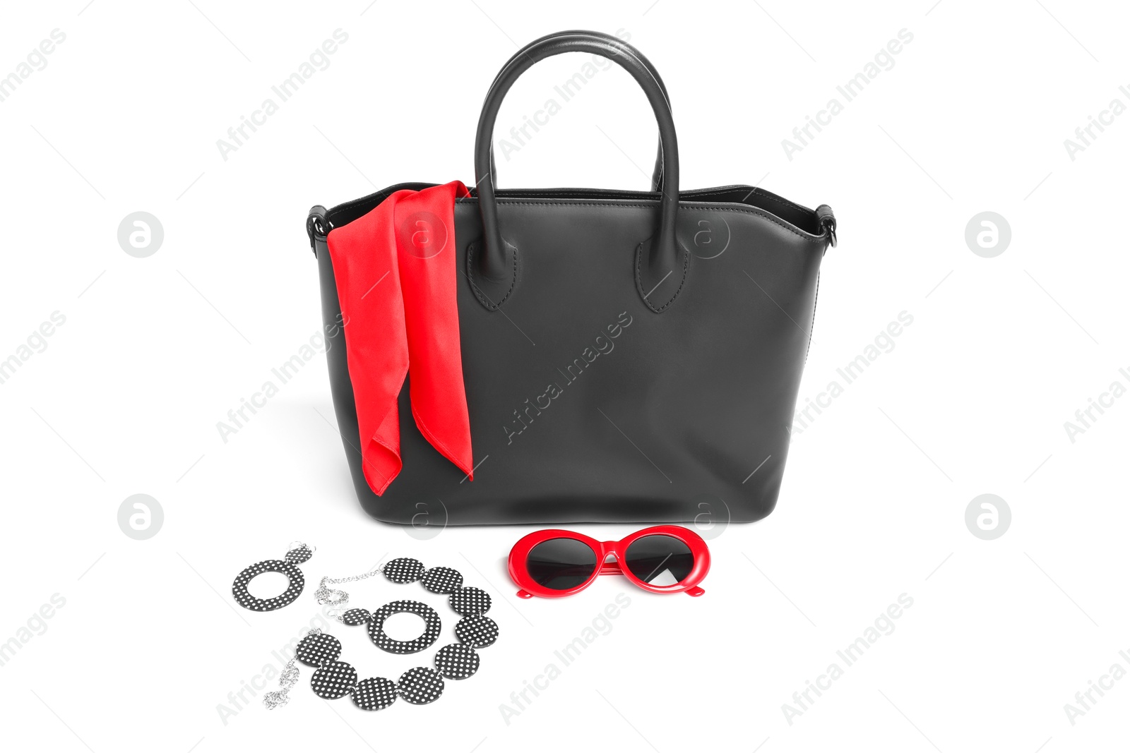 Photo of Stylish bag and other accessories on white background