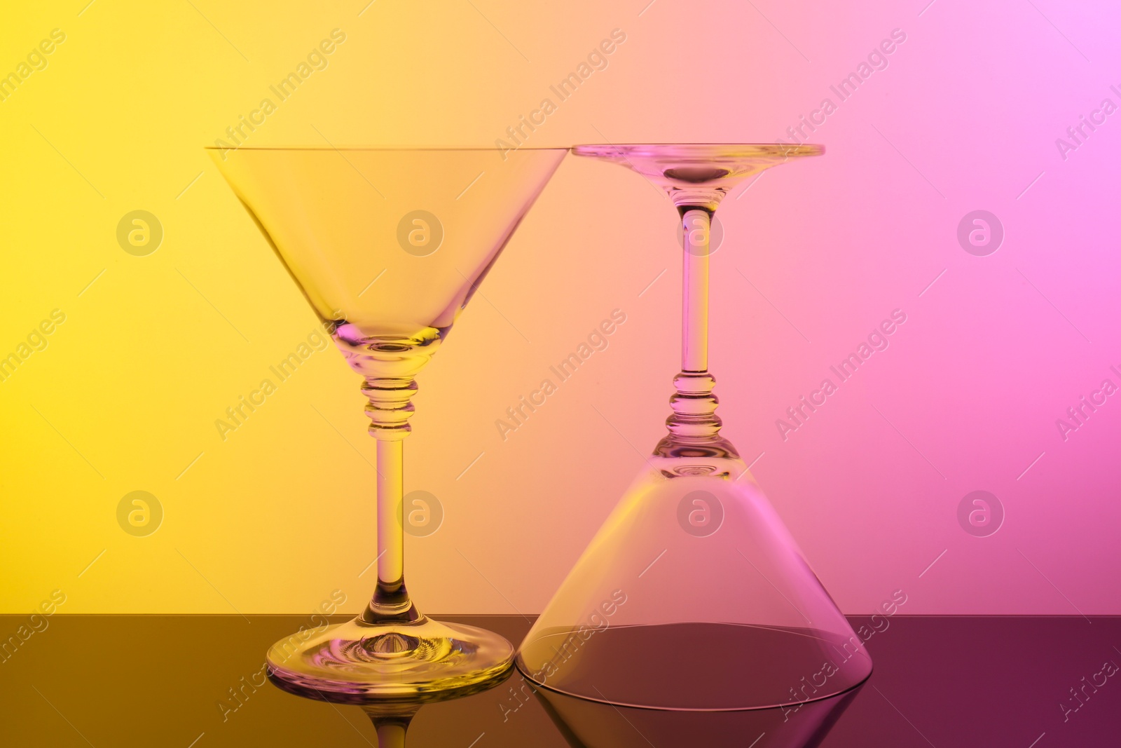 Photo of Empty glasses on table, color tone effect