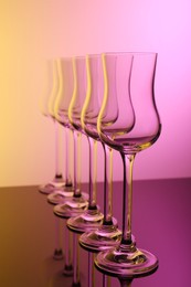 Photo of Empty glasses on table, color tone effect