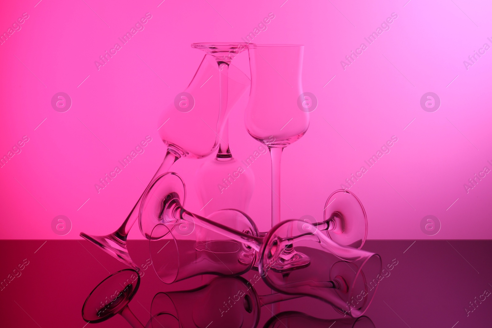 Photo of Empty glasses on table, color tone effect