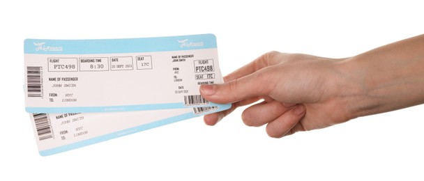 Photo of Travel agency. Woman holding flight tickets on white background, closeup