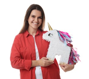 Photo of Happy woman with unicorn shaped pinata on white background