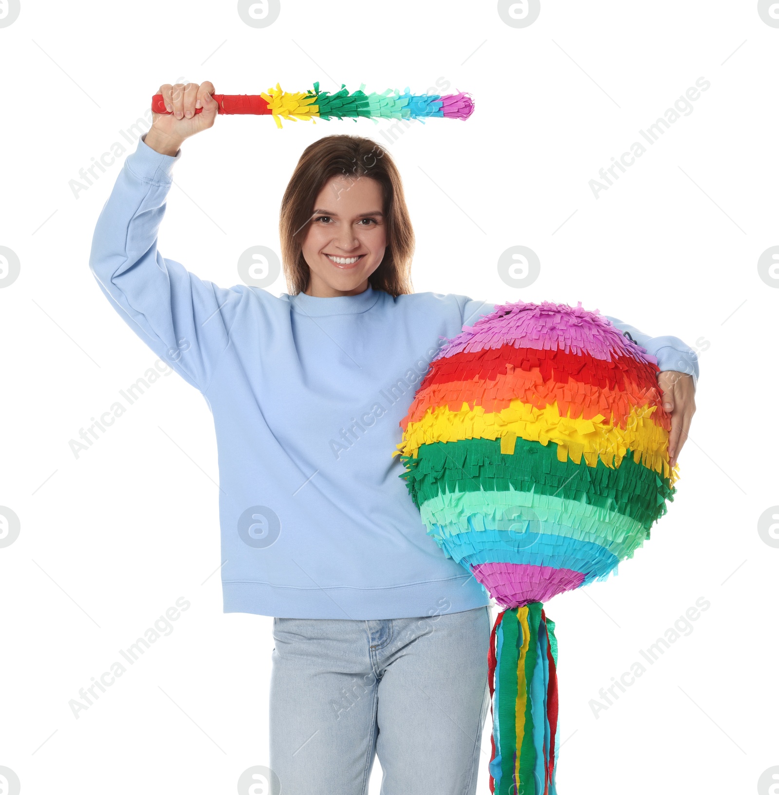 Photo of Happy woman with colorful pinata and stick on white background