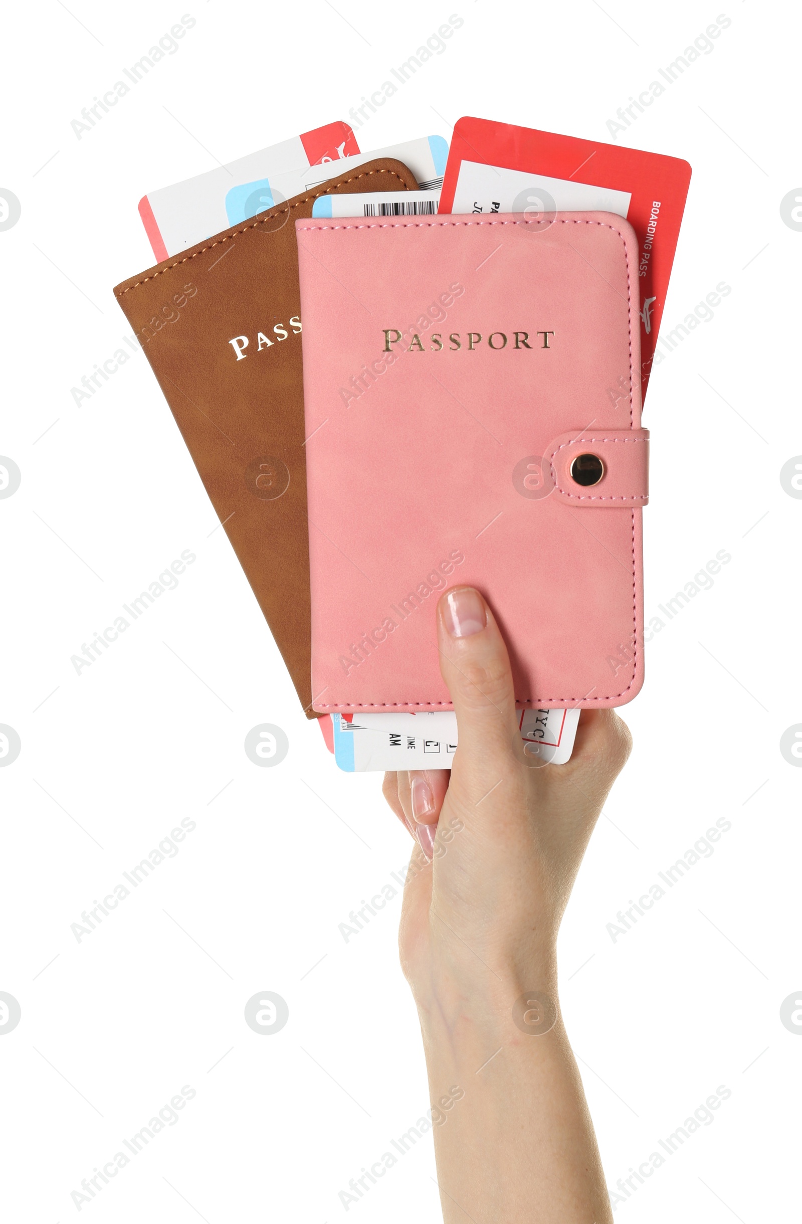 Photo of Woman holding passports with tickets on white background, closeup