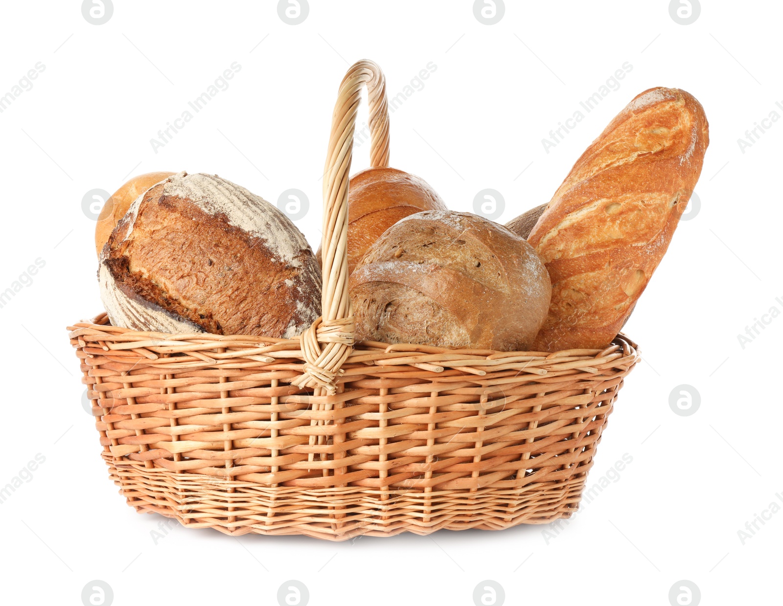 Photo of Different freshly baked bread loafs in wicker basket isolated on white