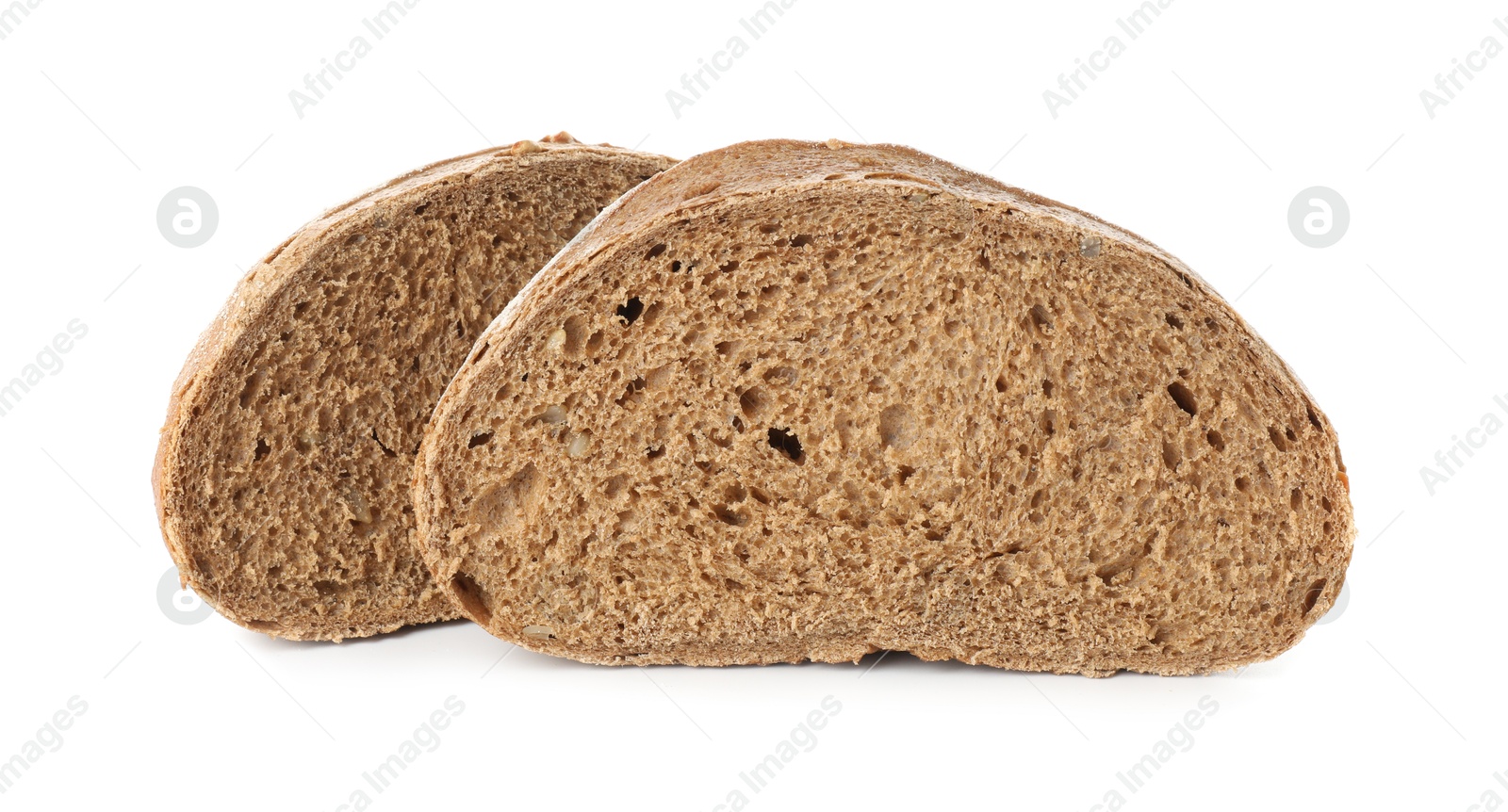 Photo of Freshly baked halves of bread isolated on white