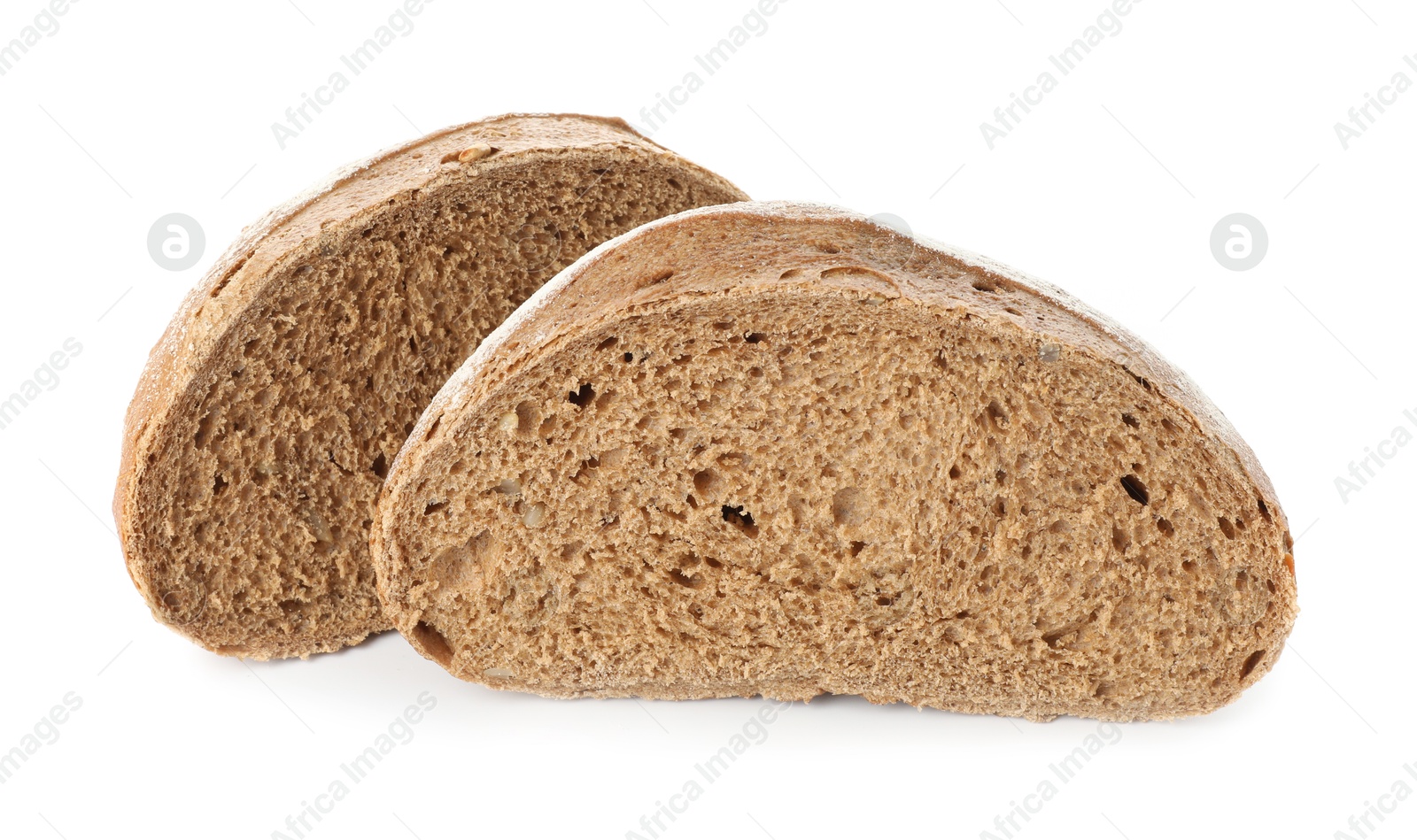 Photo of Freshly baked halves of bread isolated on white