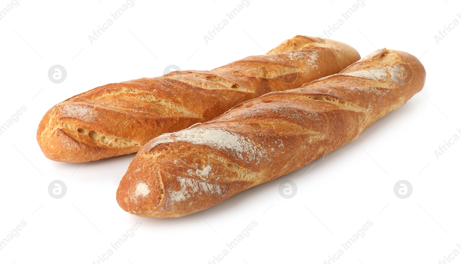 Photo of Freshly baked bread. Baguettes isolated on white