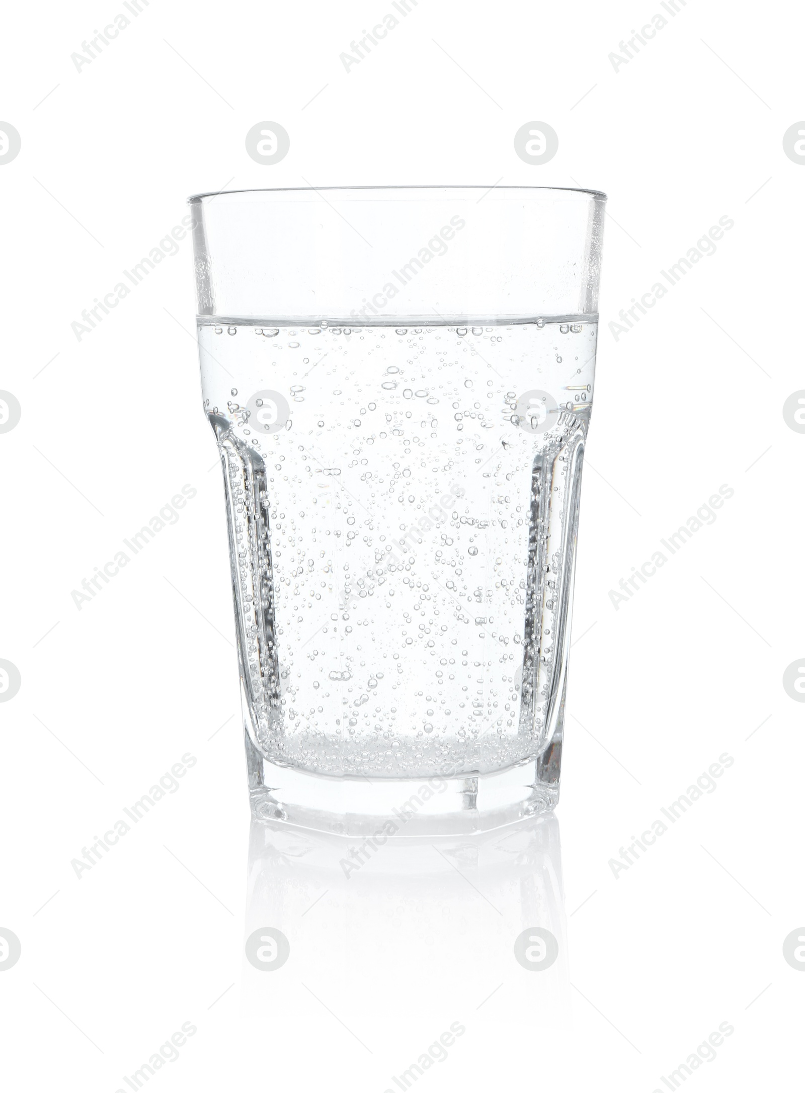 Photo of Glass of refreshing soda water isolated on white