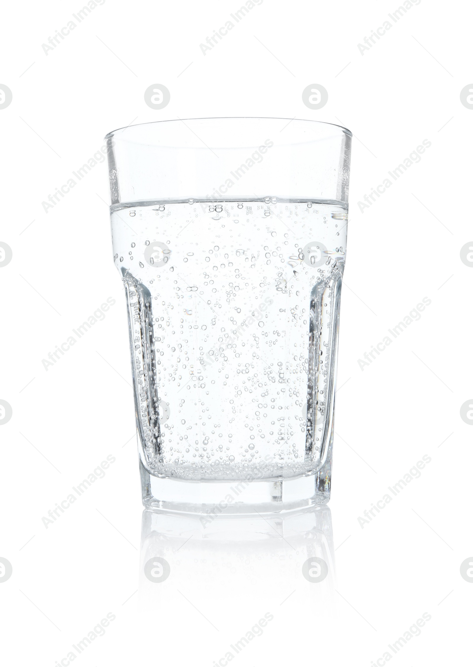 Photo of Glass of refreshing soda water isolated on white