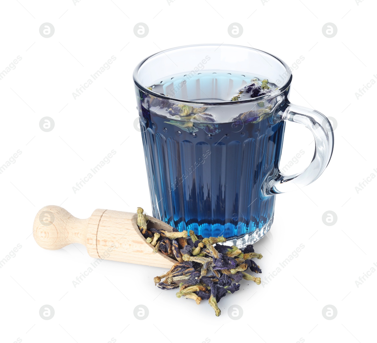 Photo of Fresh butterfly pea flower tea in cup and scoop with dry petals isolated on white