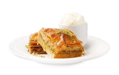 Photo of Delicious baklava with crushed nuts and ice cream on grey table, closeup