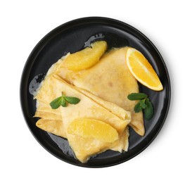 Photo of Delicious Crepes Suzette dessert isolated on white, top view