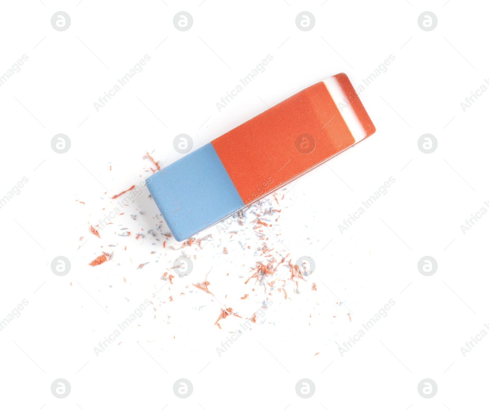 Photo of One eraser and scraps isolated on white, top view