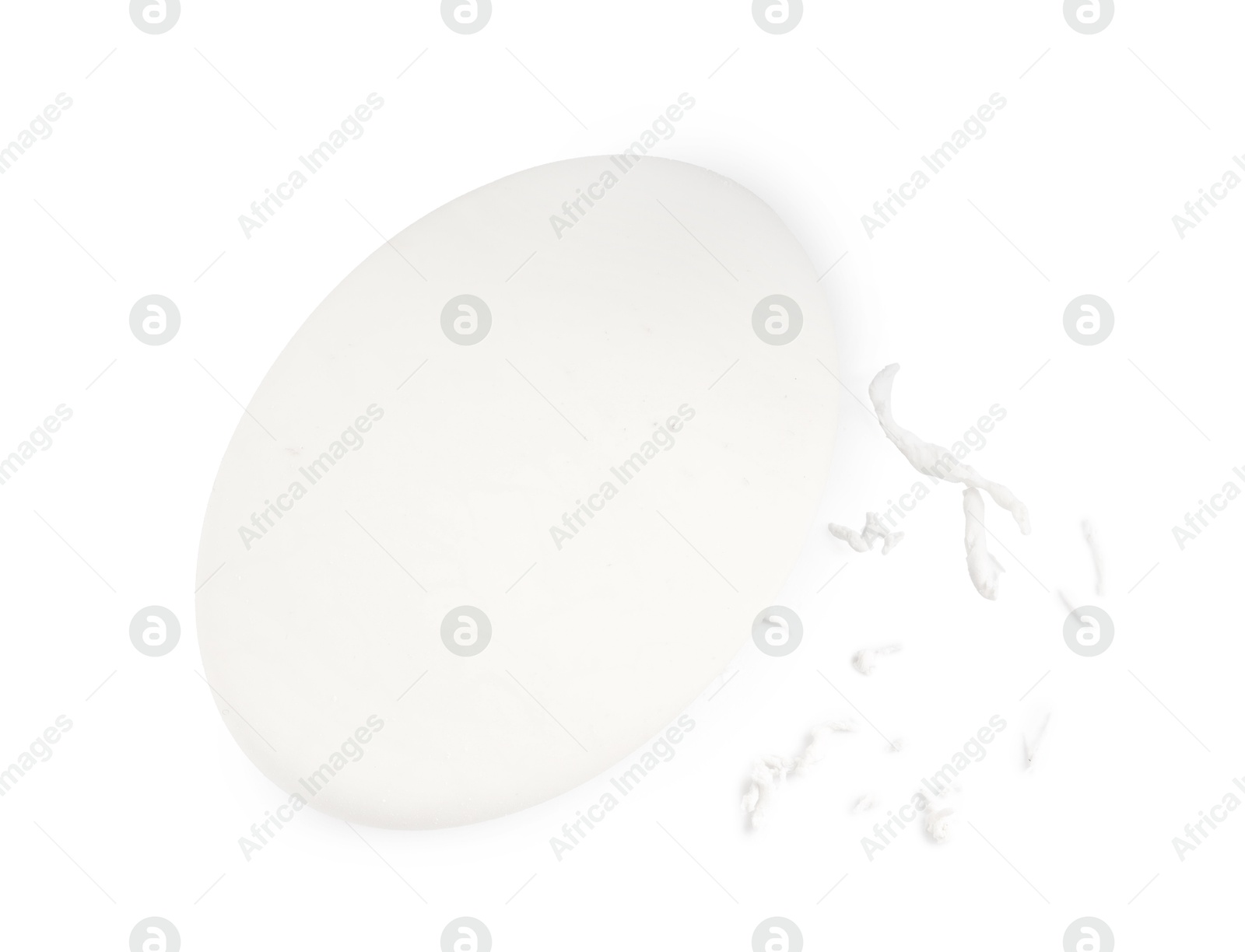 Photo of One eraser and scraps isolated on white, top view