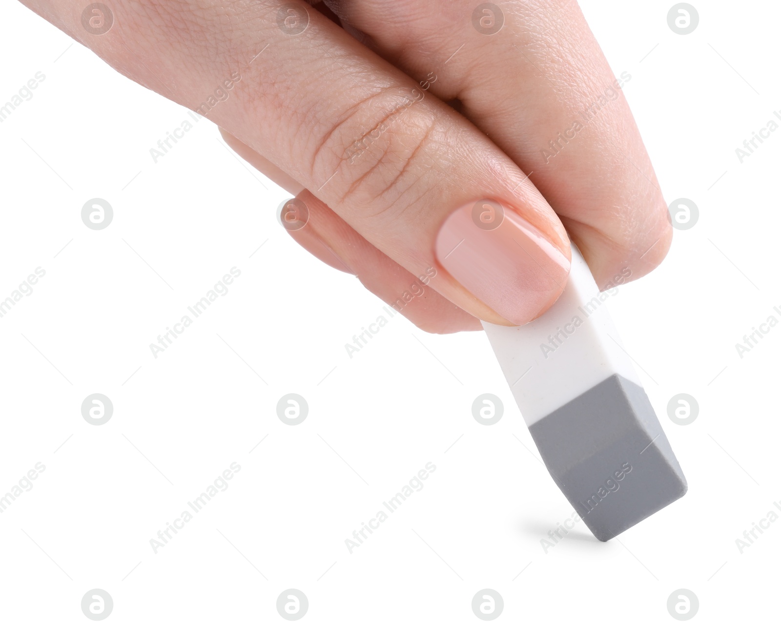 Photo of Woman using eraser on white background, closeup