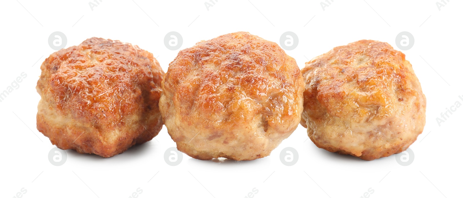 Photo of Three tasty cooked meatballs isolated on white