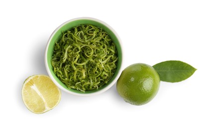 Photo of Lime zest and fresh fruits isolated on white, top view