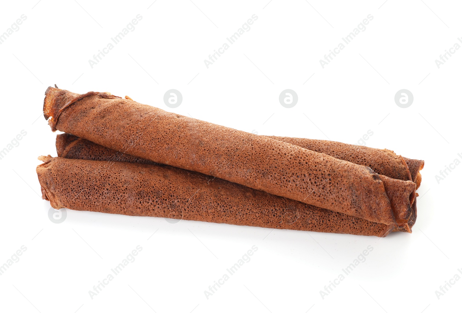 Photo of Rolled delicious chocolate crepes isolated on white