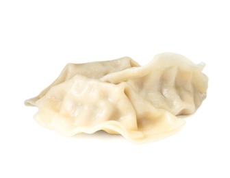 Photo of Tasty boiled gyoza (dumplings) isolated on white