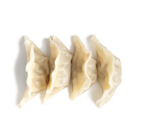 Photo of Tasty boiled gyoza (dumplings) isolated on white, top view