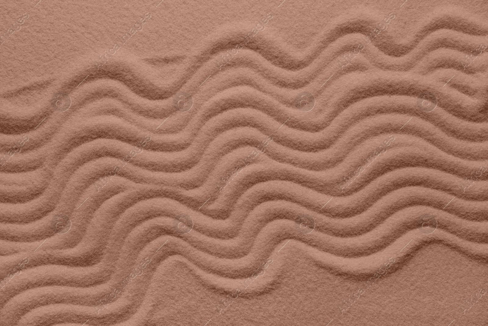 Image of Brown sand with pattern. Mocha mousse - color of 2025 year