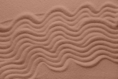 Image of Brown sand with pattern. Mocha mousse - color of 2025 year