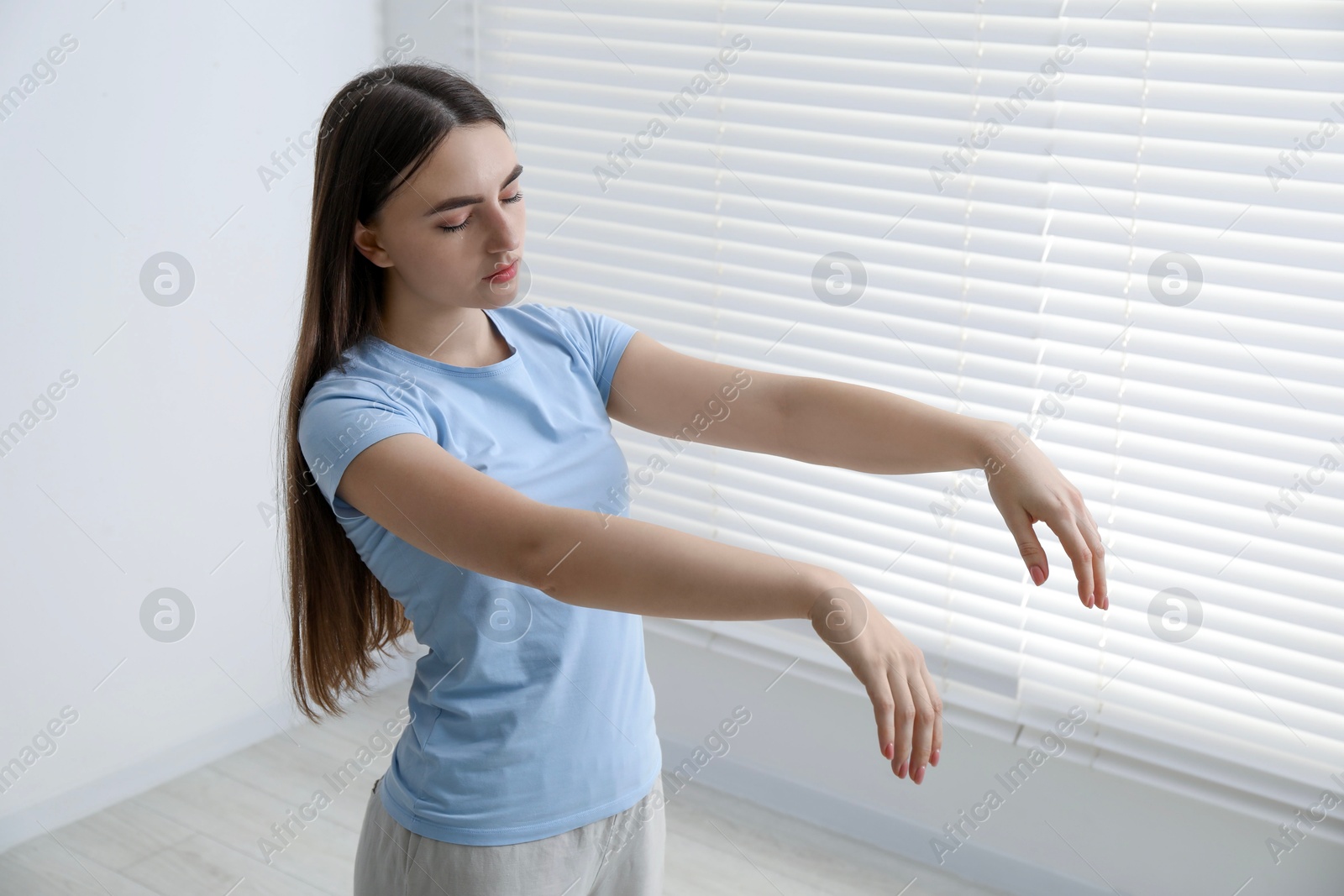 Photo of Young woman suffering from sleepwalking at home