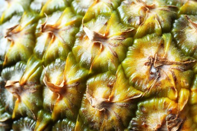 Photo of Delicious ripe pineapple as background, closeup view