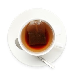 Photo of Tea bag in cup with hot drink isolated on white, top view