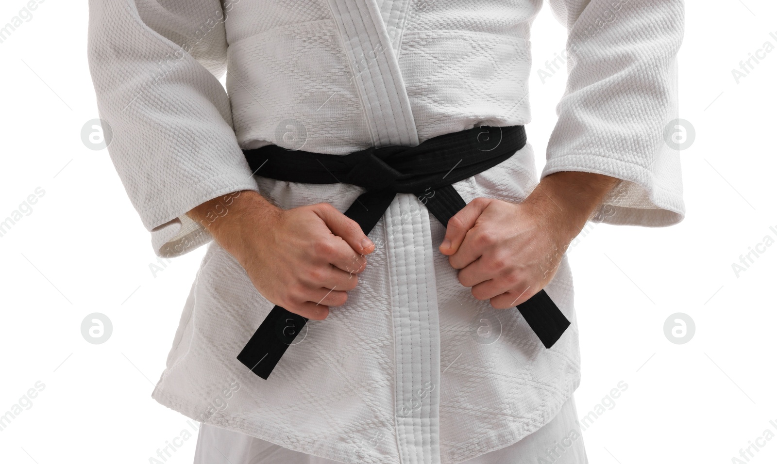 Photo of Karate fighter in uniform on white background, closeup