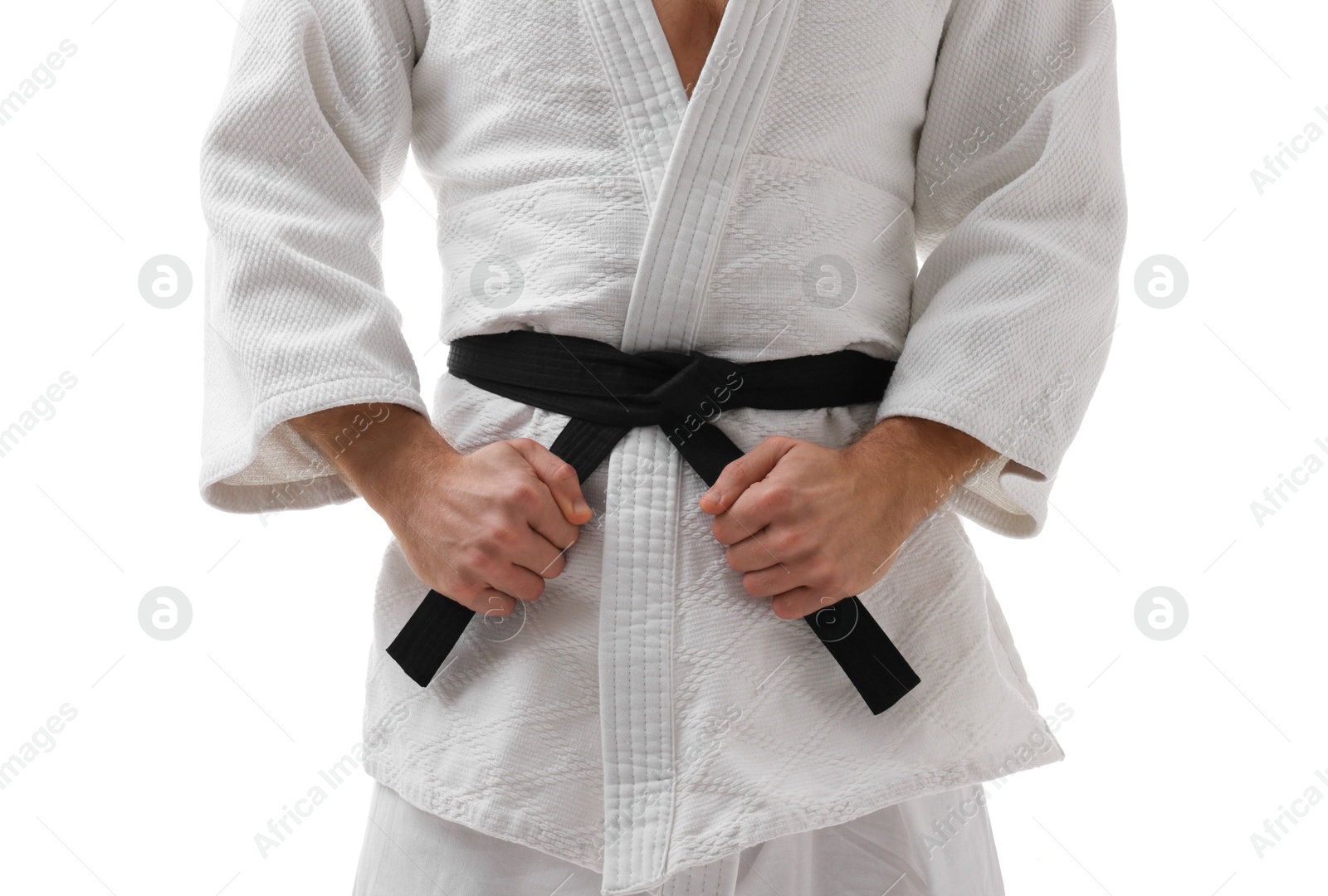 Photo of Karate fighter in uniform on white background, closeup