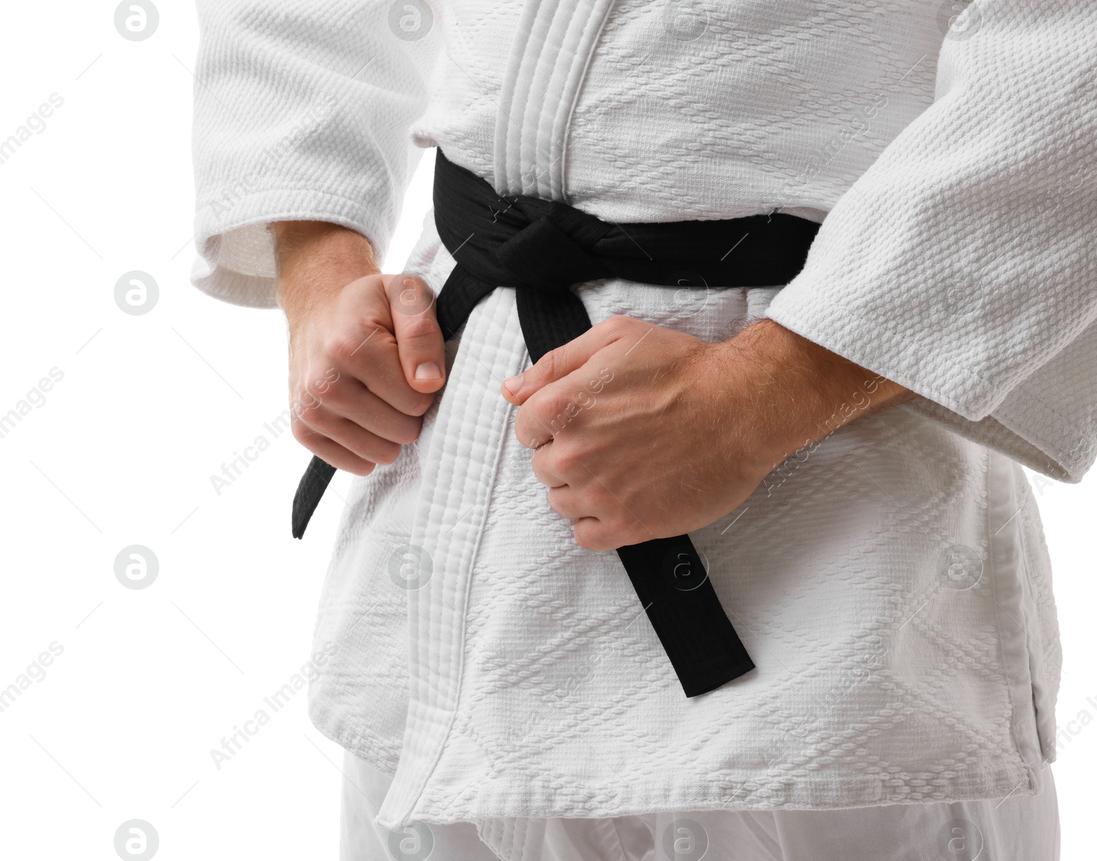 Photo of Karate fighter in uniform on white background, closeup