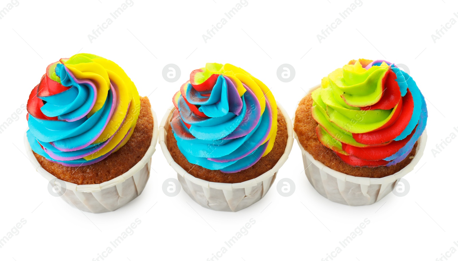 Photo of Tasty cupcakes with colorful cream isolated on white