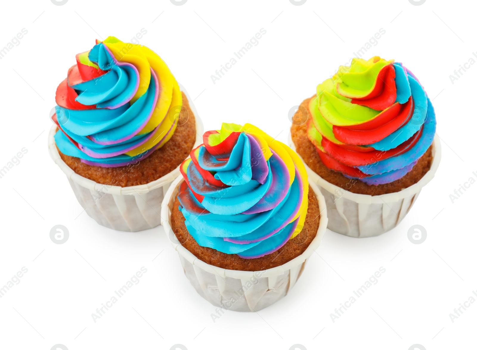 Photo of Tasty cupcakes with colorful cream isolated on white