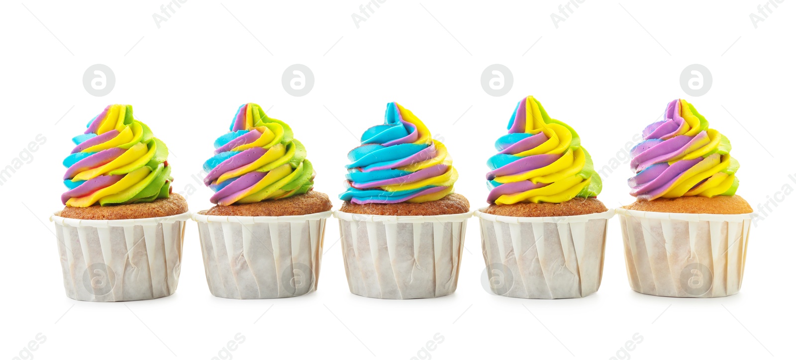 Photo of Tasty cupcakes with colorful cream isolated on white